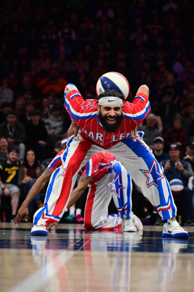 Lou Dunbar II performing on the arena floor