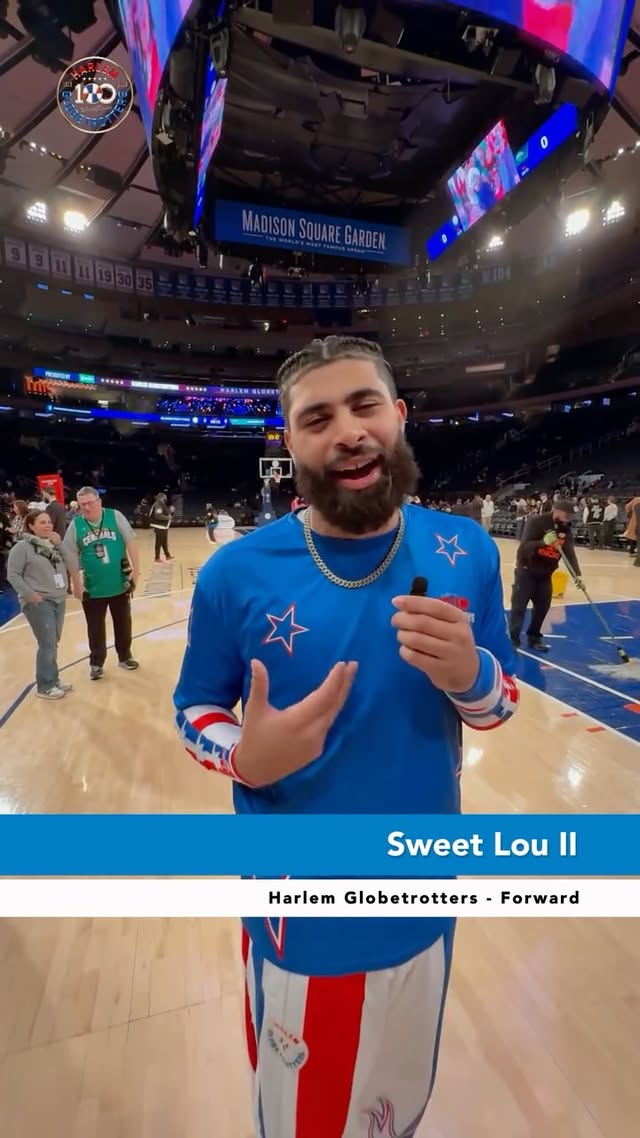 Lou Dunbar II on the court at Madison Square Garden with the MSG banner visible